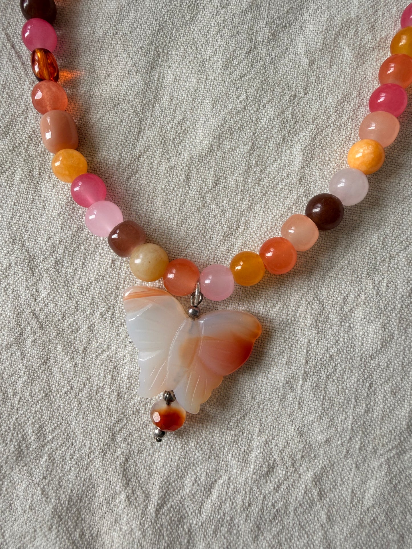 Ombre butterfly on sunset beads