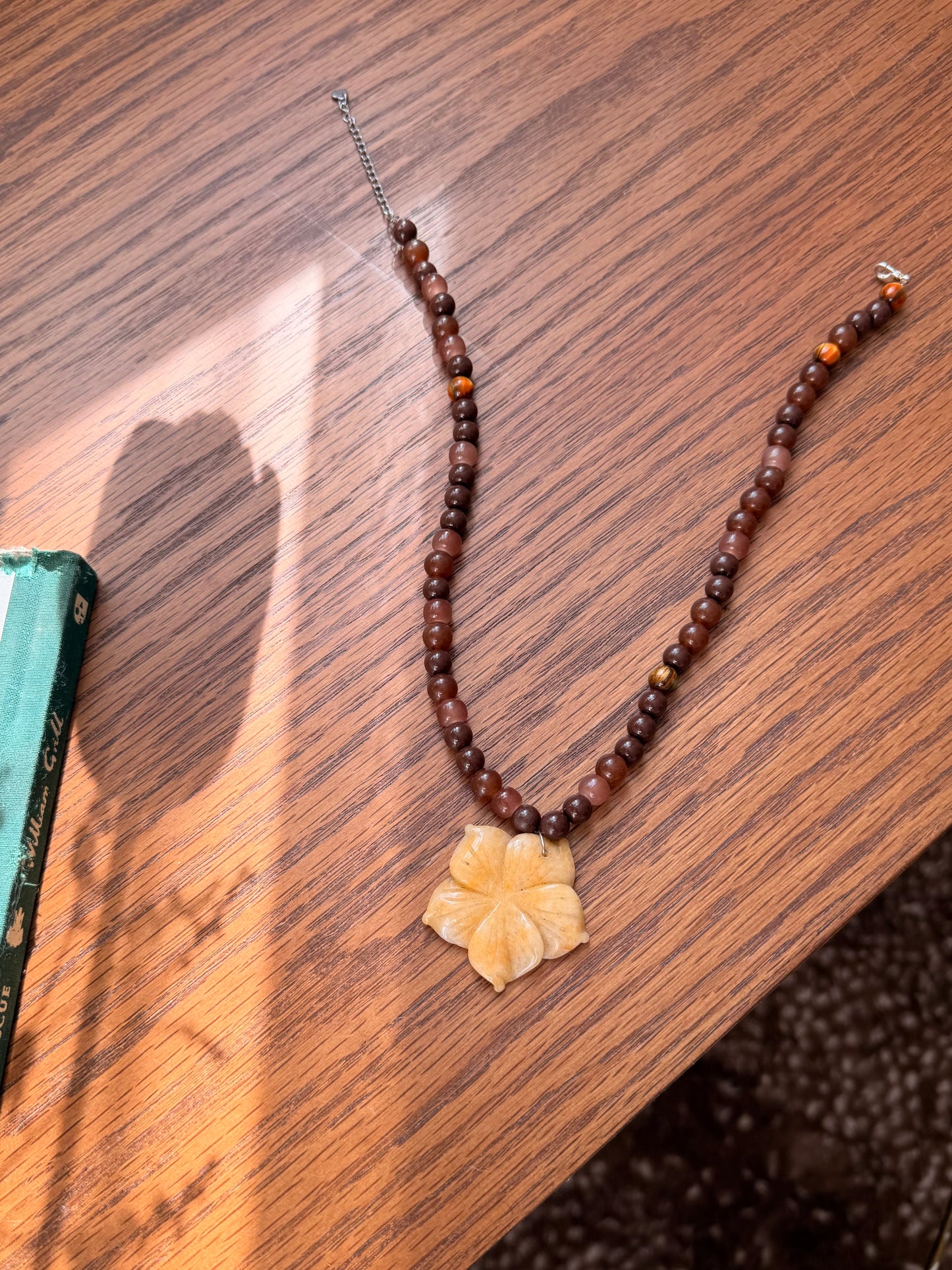 Beachy flower on brown beads