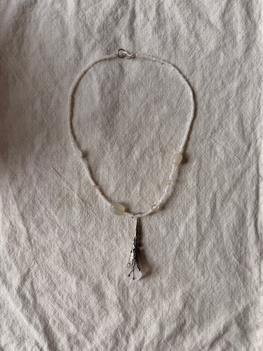 Vintage flower on soft white beads