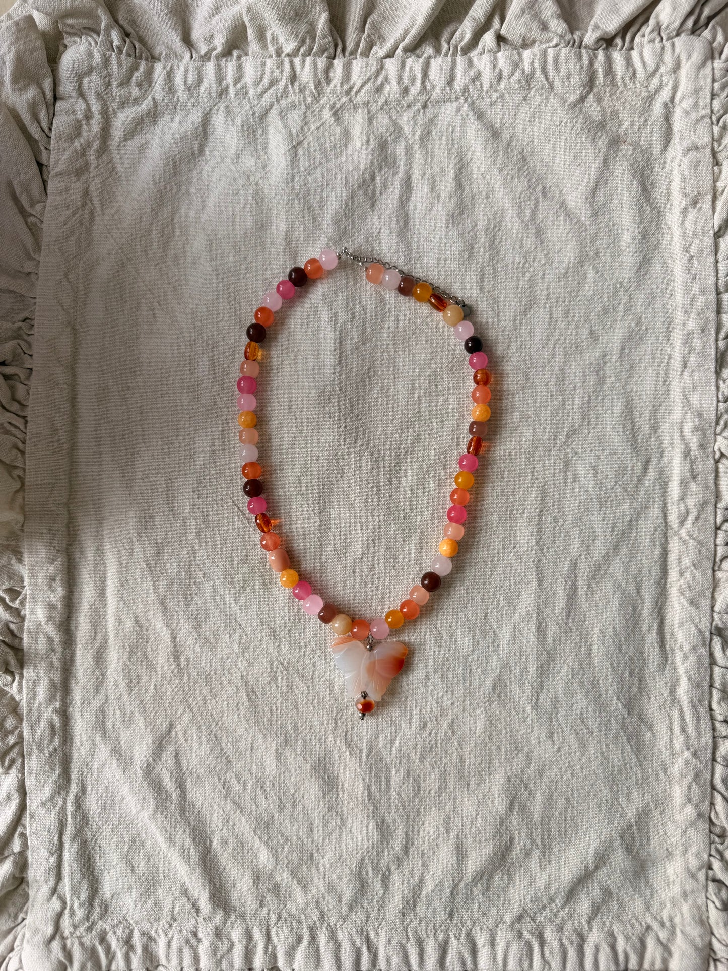 Ombre butterfly on sunset beads