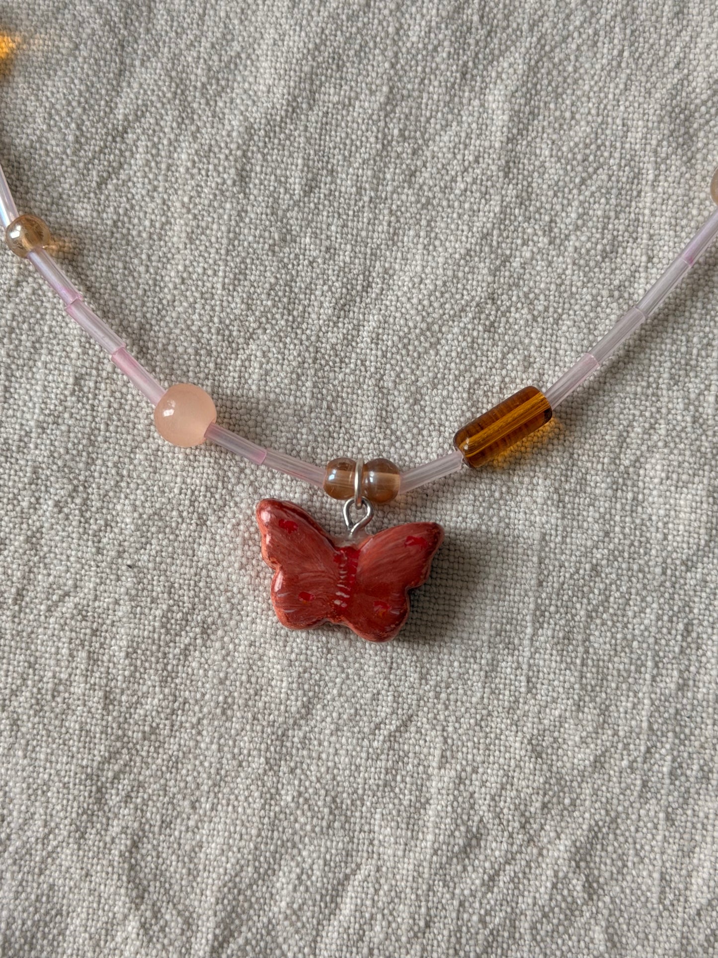Dainty butterfly - soft neutral pink