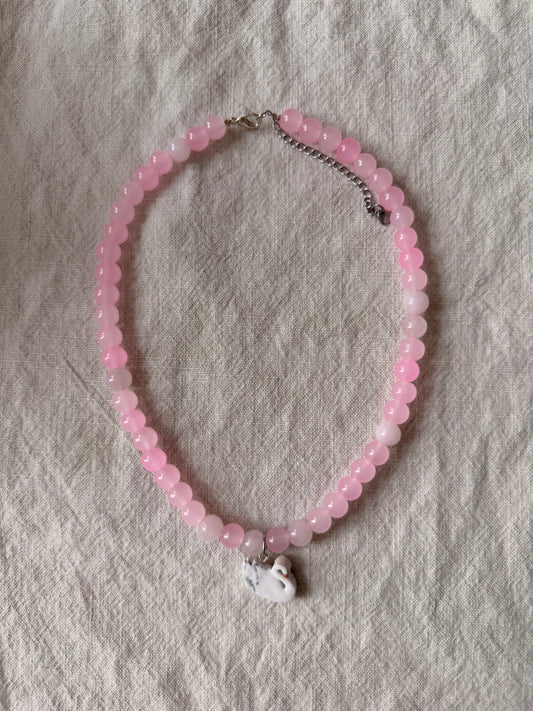 Swan on pink beads