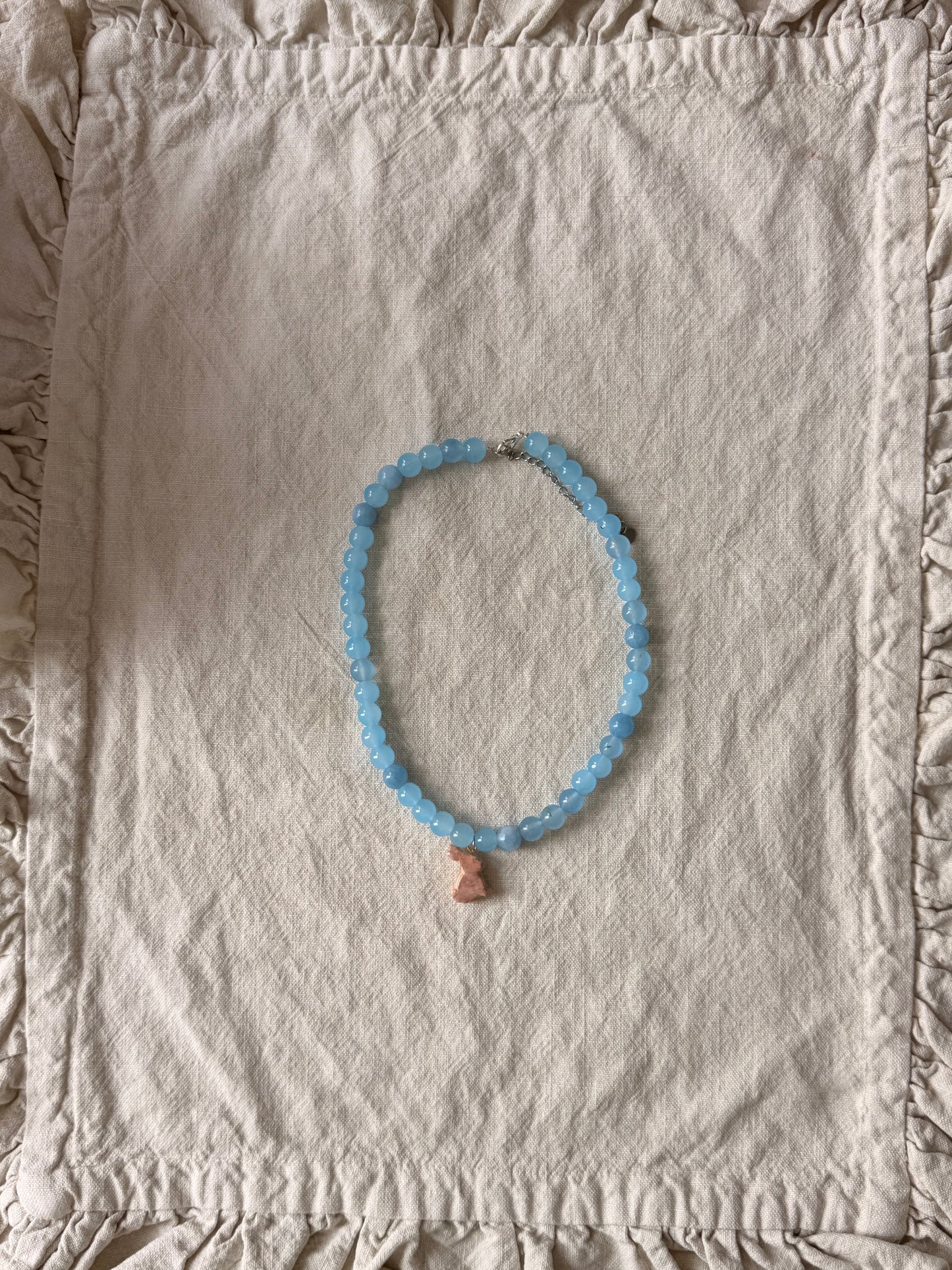 Bunny on baby blue beads