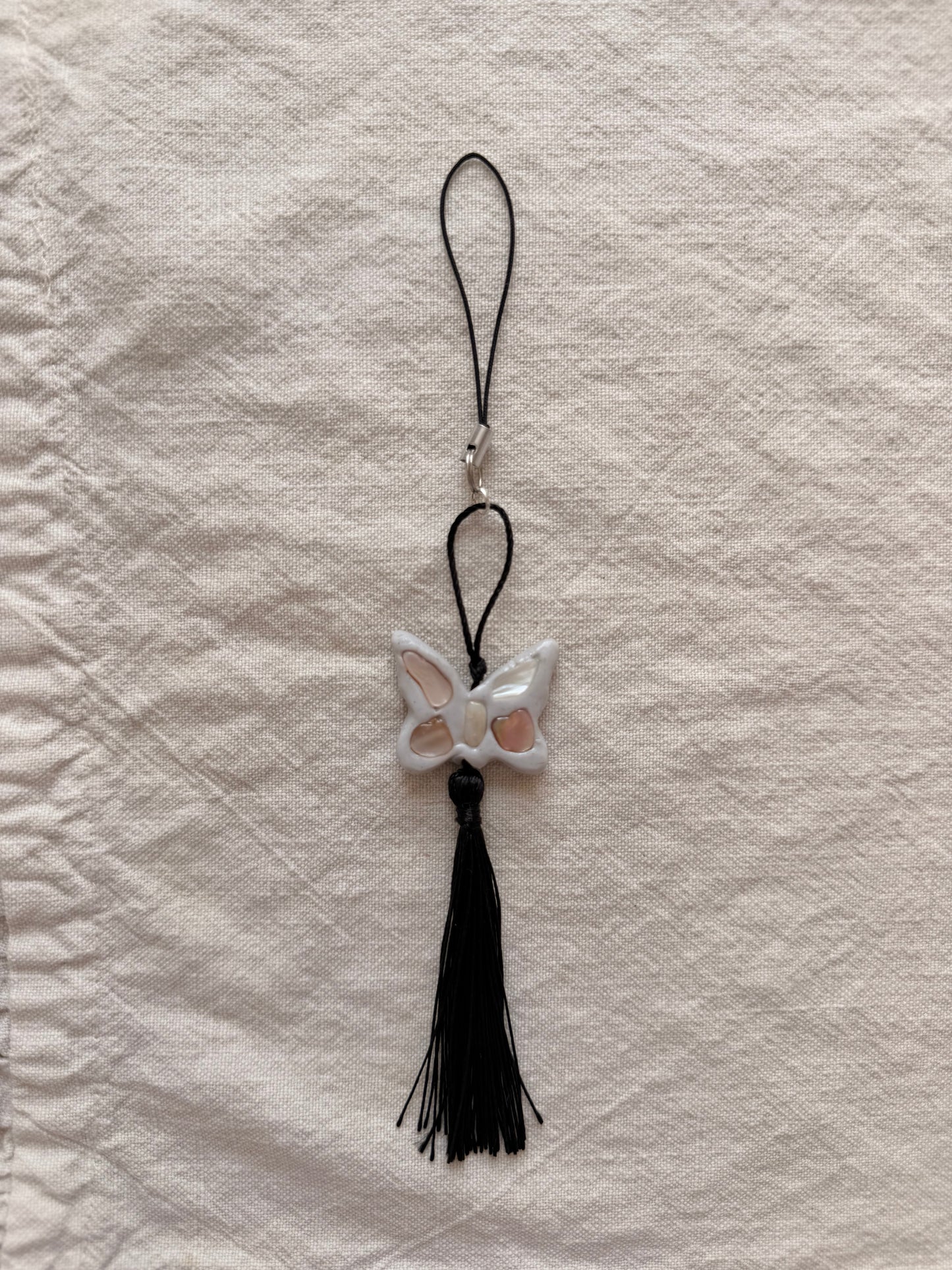 Fawn butterfly phone charm